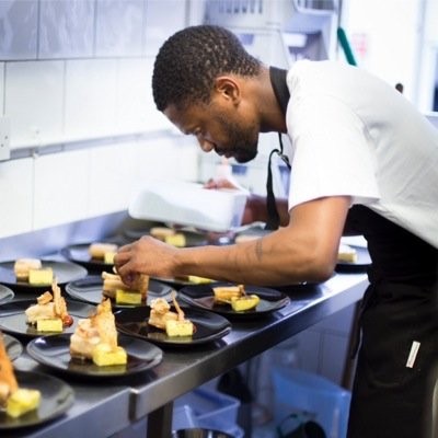 Chef Sheu Mhaka plating up